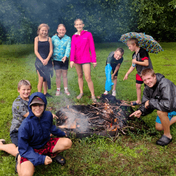 Happy children showing off projects at preschool