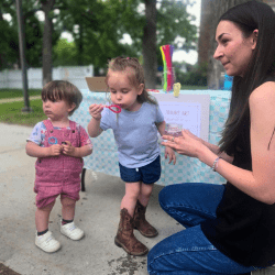 Children blowing bubbles